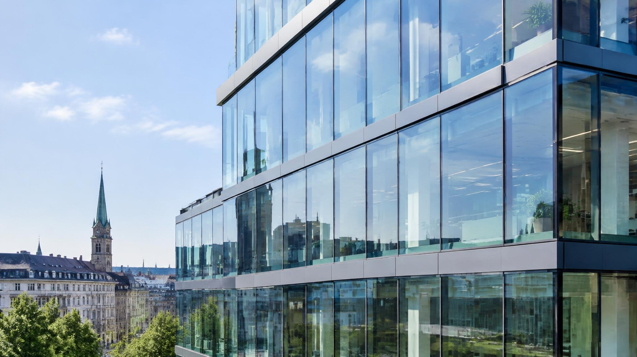Glass facade of a modern office building in a European city